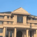 邵阳黄金麻别墅外墙干挂石材效果示例